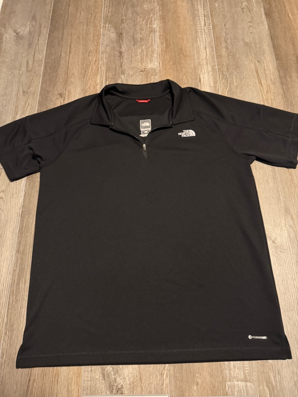 The North Face Flash Dry Men’s Black Short-Sleeve Quarter-Zip Polo